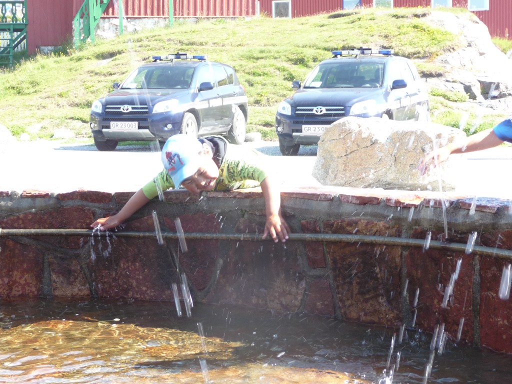 Boy in fountain